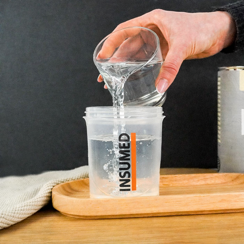 Zubereitung Schritt 1 - Wasser in Shaker geben